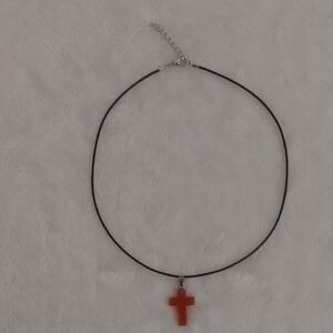 Elegant Black Necklace with Orange Cross Pendant